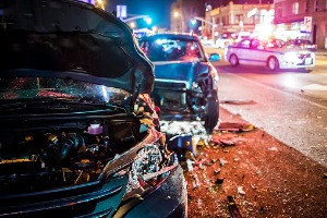 The aftermath of a car collision, where the driver will need an Auto Accident Lawyer in East Peoria IL